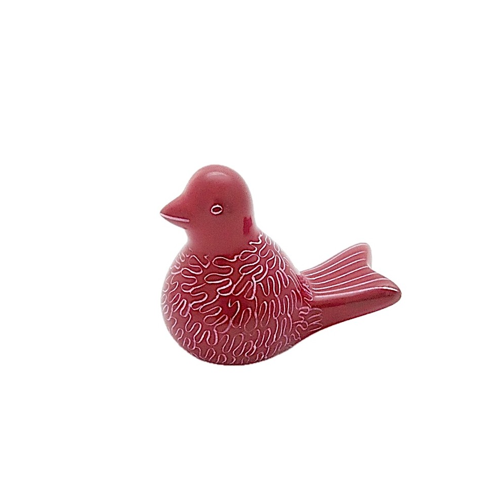 Oiseau rouge en saponite